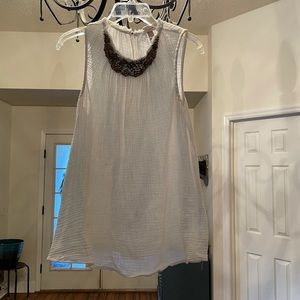 Cream, sequined neck top. Size M